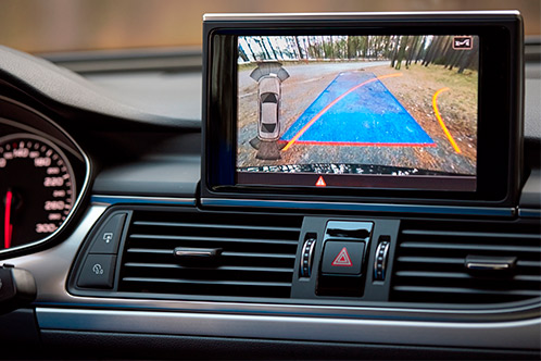 Dashboard-mounted rear view camera, showcasing a key safety feature for novice drivers.